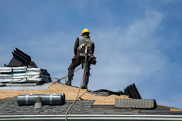 Professional Gutter Installation technician working in Rich Hill, MO